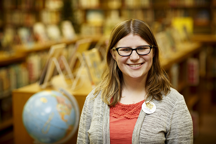 Student teacher in library